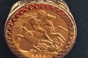 full sovereign mounted in 9ct gold ring