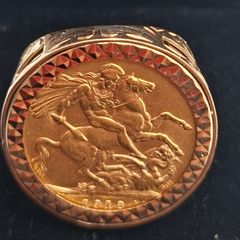 full sovereign mounted in 9ct gold ring