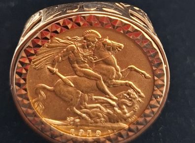 full sovereign mounted in 9ct gold ring