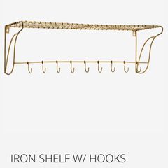Danish interior design antique brass shelf with hooks