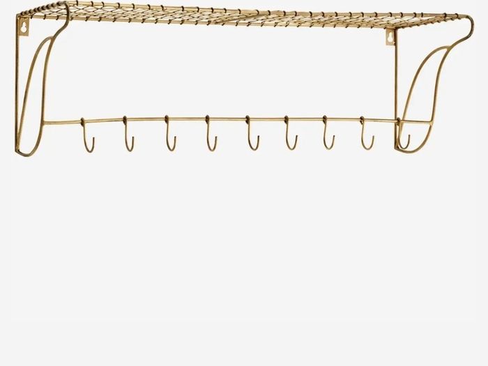 Danish interior design brass shelf with hooks