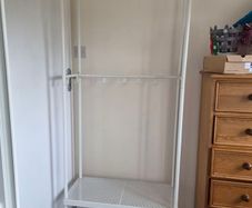 Coat rack with shoe storage unit