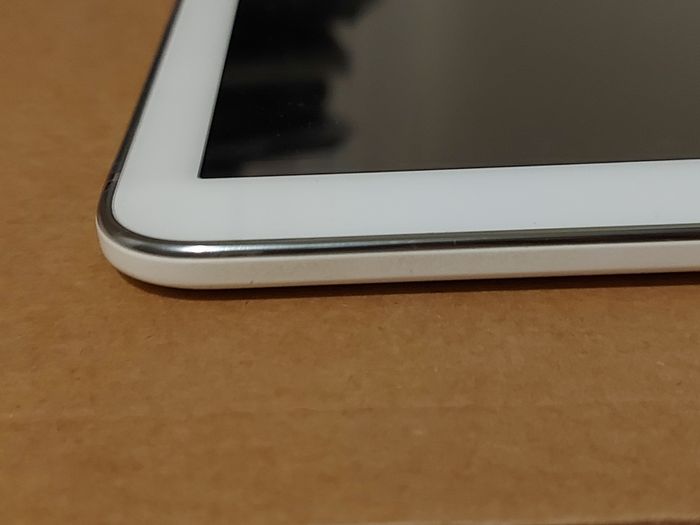 Samsung Galaxy Tab 4, Model SM-T530, 16GB, White, working great, in excellent condition and with a bunch of Family-children  movies