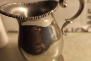 Pewter rmilk jug.