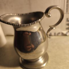 Pewter rmilk jug.
