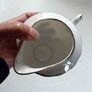 Milk Jug & 4 Saucers (used). Image 3