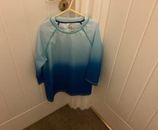 Light blue T-shirt age 9/10