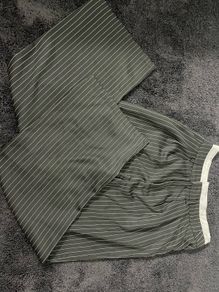 Black trousers with white strips