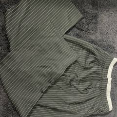 Black trousers with white strips