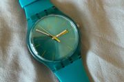 Swatch watch unisex turquoise rebel, like new, mint condition