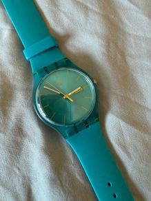 Swatch watch unisex turquoise rebel, like new, mint condition