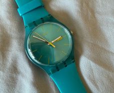 Swatch watch unisex turquoise rebel, like new, mint condition