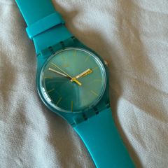 Swatch watch unisex turquoise rebel, like new, mint condition