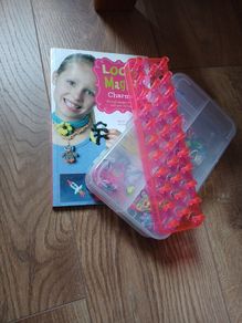 loom bands box, tool, and book.