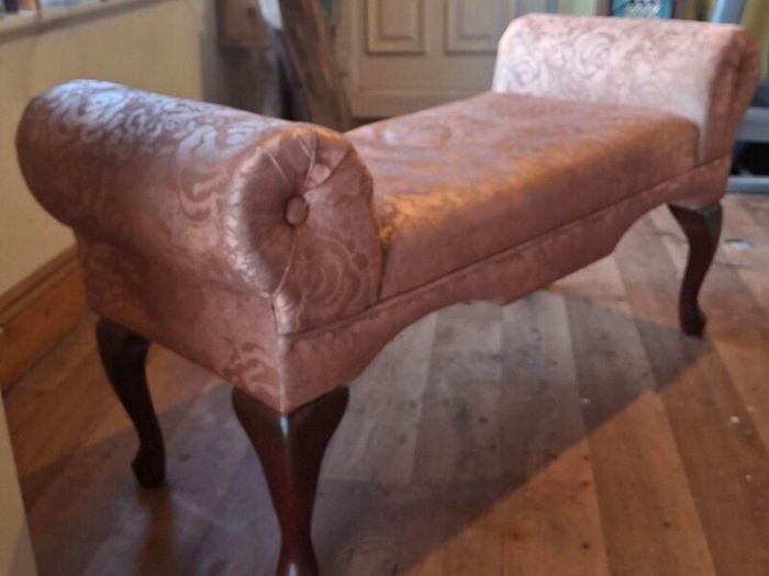 very old small type sofa