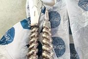 Silver-plated utensil fish carving set or serving set, noted by the specific shape of the knife blade.