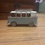 vintage Volkswagen caravan Elle with surfboard on top Image 4