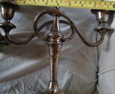 a matching pair of traditional three light candlelabras silver plated