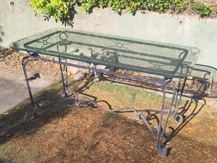 Garden table with glass top