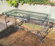 Garden table with glass top