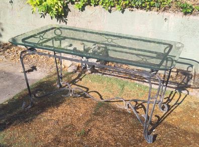 Garden table with glass top