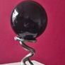 Obsidian glass ball and metal Serpent stand. Image 2