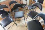 8 foldable chairs