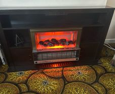 Freestanding electric fire unit
