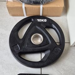 brand new 2x10kilo olympic weight plates .