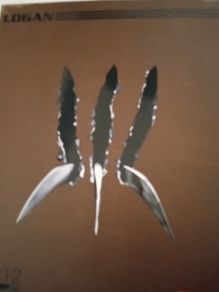 Mezco  Logan Wolverine Marvel Action Figure