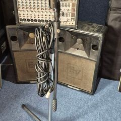 Small PA System plus microphone and stand.