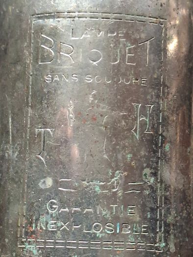 Antique French Lampe-Briquet lighter lamp manufactured by the brand TH. It is described as Sans Soudure The inscription Inexplosible indicates it was marketed as a safety product, often dating from before 1900s