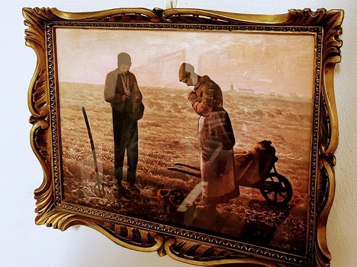Pair of vintage reproductions behind glass
