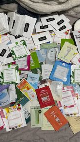 Over 100 pcs bundle of Korean skincare samples bundle bloating paper and exfoliating gloves all new perfect for travel or try before you buy full size