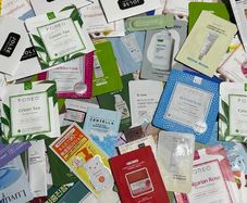 Over 100 pcs bundle of Korean skincare samples bundle bloating paper and exfoliating gloves all new perfect for travel or try before you buy full size