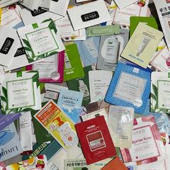 Over 100 pcs bundle of Korean skincare samples bundle bloating paper and exfoliating gloves all new perfect for travel or try before you buy full size
