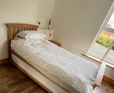 Single oak bed with trundle