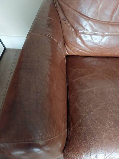 2 seater brown leather sofa. Approx 150cm width, approx 90cm breadth/ from back to front