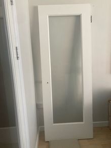 Solid timber door with glass panel