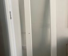Solid timber door with glass panel