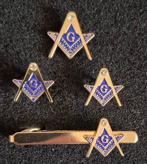 Masonic set, tie pin, lapel badge and cufflinks.