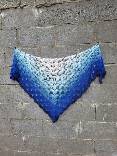 Handmade crochet triangle shawl wrap. Blue and white ombre lacy shawl