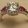 Moissanite Solitaire Ring with Natural Ruby Accents Image 8