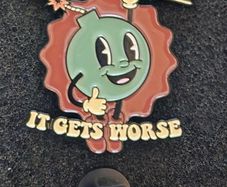 Hang in there !,  pin back badge.