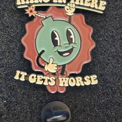 Hang in there !,  pin back badge.