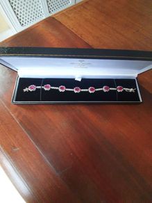 Stg silver bracelet, ruby and diamond colour gemstones