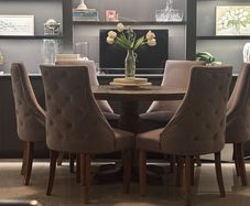 Dining table with 6 grey velvet chairs