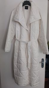 Capsule White Quilted Longline Coat.