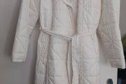 Capsule White Quilted Longline Coat.