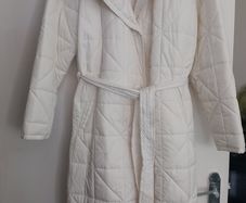 Capsule White Quilted Longline Coat.